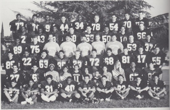 JV team (1990). Top row (left to right): Regan Upshaw, Guillermo Hernandez, Lief Hall, Kris Leffle, Bobby Chatman, Zackary Gunter, Bobby Gonzalez, John McCoy, Dan Jordan. Fifth row: Brian Horace, Will Grisby, Nelson Wiley, Julio Coronado, Nehemiah Lopez, Kevin Womack, Mike Gargalakis, David Muller. Fourth row: Detrick Edwards, Mike Durflinger, Coach Steve Camitz, Coach Kevin Confetti, Head Coach Herc Pardi, Coach Dave Kehler, Coach Sam Quinones, Shannon Lowery, Luis Duenas. Third row: Harry Wyles, John Rice, Chris Sambrano, Michael Guintu, James Oxford, Rueben Mendez, Jeff Littlejohn, Marko Estrada, Anthony Shipe. Second row: Jeff Madriaga, Roy Passmore, Jaynette Lancaster (cheerleader), Sofia Rosalez (cheerleader), Adrea Kehler (mascot), Monica Marin (cheerleader), Justin Kehler (mascot), Alexis Bruno (cheerleader), Melissa Adams (cheerleader) Vernice Taylor, James Byrne. Front row: Chris Pahule, Kikwon Haywood, Bo Xaysana, Lee Cooper, Dinh Nguyien, Joshua Hemmick, Panyathip Vongphachanh, Jeff Jimenez, Micah Nutt.