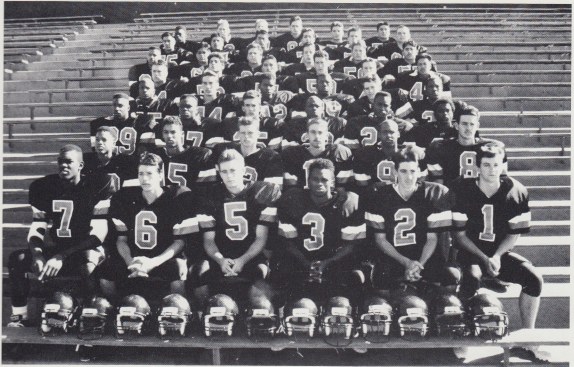 Varsity team (1990). Front Row (left to right): James Stallworth, Chris Shipe, Jeremy Almond, Erik Alston, Greg Quesada, Jason Roy. Row 2: Marlon Porter, Greg Santiago, Ryan Laurie, Patrick Jaggers, Keith Weatherspoon, Jason Crokaerts. Row 3: Chris Willis, Dwayne Clark, Aaron Alatorre, Terrance Currie, Sean Anglon, Tyree Hornbeck. Row 4: Percy McGee, Lance Cardenes, Jerry Forrest, Shawn Fuller, Kenneth Thompson, Ray Harts. Row 5: John Rivera, Jim Coniglio, Jesse Tyquiengco, Jon Buxton, Micheal Headley, Jesse McGill. Row 6: Charles Williams, Gerald Cabrera, Frank Aiello, Marcus Garcia, Tyler Conlin, Chris Pineda. Row 7: Enrique Cerda, Ivan Rivera, Doug Gusimat, Chris Mendez, Edward Hoemer. Back Row: Vida Celestine, Richard Hammond, Robert Hammond, Ryan Brinkman, Jesse Gonzalez, Romell Lindawan.