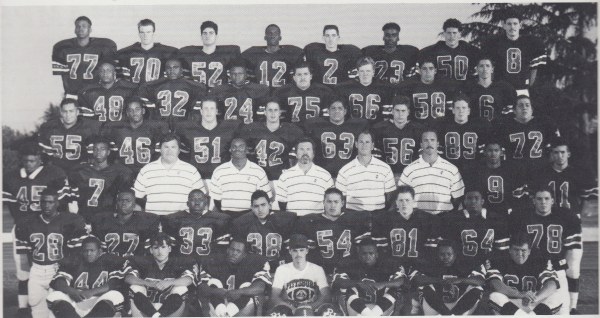 Varsity team (1991). Bottom (Left to Right): Lee Cooper, Leonard Marquez, Derek Huffman, Mike Campell, Erik Alston, Tyree Hornbeck, Frank Aiello. 2nd Row: Willie Grisby, Dewayne Clark, Shawn Fuller, Rueben Mendez, Ray Kelley, Jeff Littlejohn, Kevin Womack, Jesse Gonzalez. 3rd Row: Percy McGee, Ontario Johnson, Sam Quinones, Lenny Davis, Herc Pardi, Joe Aliotti, Jerry Haflich, Greg Santiago, Aaron Alatorre. 4th Row Enrique Cerda, Paul Gaines, Shannon Lowery, Mike Gargalikis, Gerald Cabrera, Anthony Shipe, Ryan Lopez, Chris Mendez. 5th Row: Dysuun Beshears, Bob Chatman, Jerry Forrest, Julio Coronado, Mike Durflinger, Charles Ramirez, Chris Shipe. 6th Row: Regan Upshaw, Dan Jordan, Jim Coniglio, Brian Horace, Greg Quesada, Leif Hall, Jon Buxton, Jason Crokaerts.