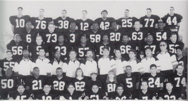 Varsity team (1994). Top row, left to right: Simon Tafoya, Michael Giambona, Michael Barnes, Mike Gaitano, James Beshears, Jonathan Osorio, Vince Gargalikis, Joey Tafoya. 2nd row: Sa[?] [?]ahdi, Adam Lopez, Shaunard Harts, Devlon Davis, Thomas Lynch, Ryan Ponce, Michael Combs. 3rd row: Marcus Fields, Jeff Coburn, Johnnie Modica, Ray[?] [?]atson, Omari Mitchell, Edward Manly, George Jordan, Mike Russo. 4th row: Eric Quesada, Coaches Lenny Davis, Vic Galli, Ronald Polk, Paul Orlando, Herc Pardi, Jo[?] [?]liotti, Vince Ferrante, Matt McMillan, Sam Quinones and Al Bonanno, William Sheppard. 5th row: Maurice Hodges, Kaylon Slaughter, Rodney Coleman, Lo[?] [?]chweikert, Sam Quinones Jr., Jennie Wheeler, Ken Simonton, Brendinn Morandin, Ron Brown. Bottom: Nestor Delgadillo, Mario Arias, Frank Narez, Eddie Ma[?], [?]hris Cordero, Jimmy Shipe, Tuong Ho.